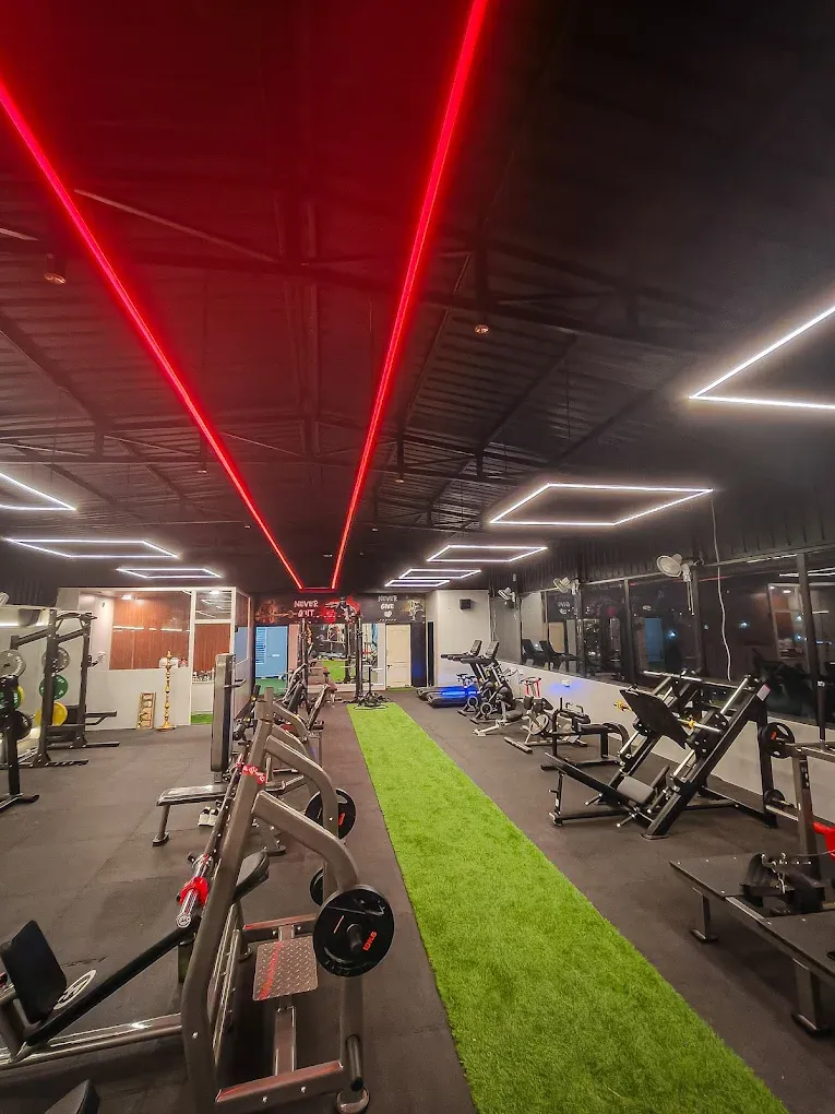 JP Fitness training floor with red lighting
